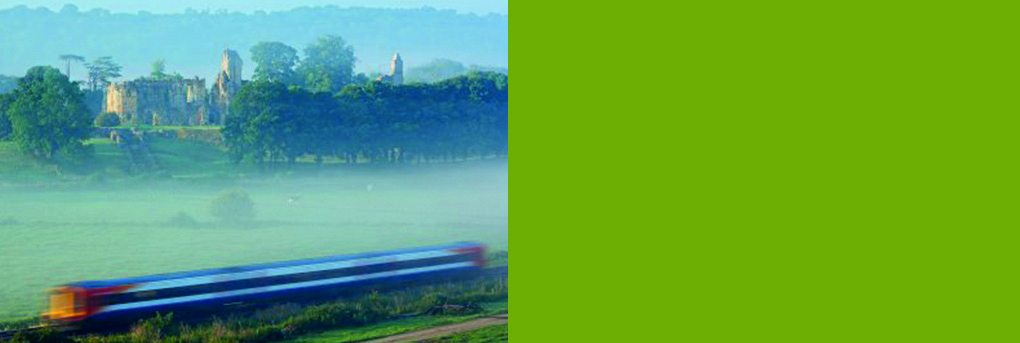 Train passing through countryside.